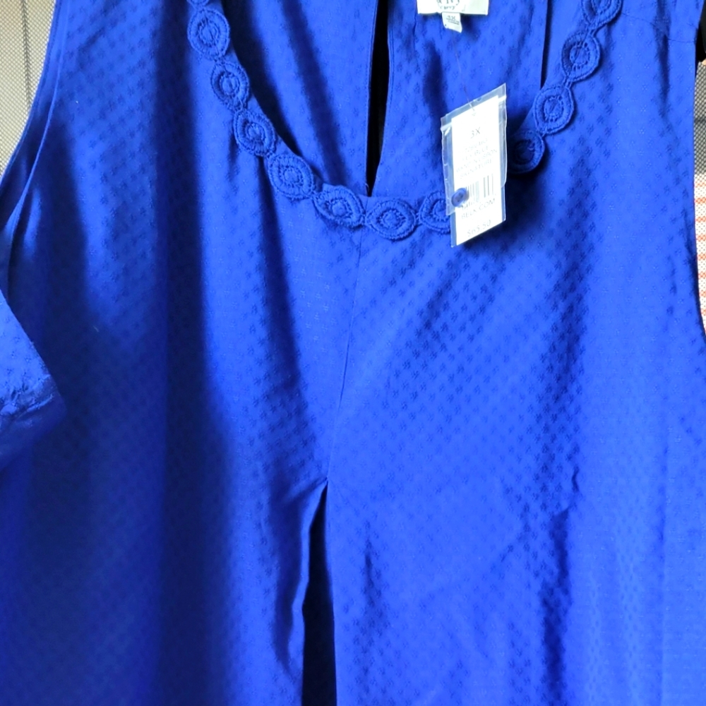 Brand new blue sleeveless top with detail collar size 3x